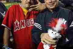 Mayor Bloomberg...holding an Angels rally monkey?!?!?